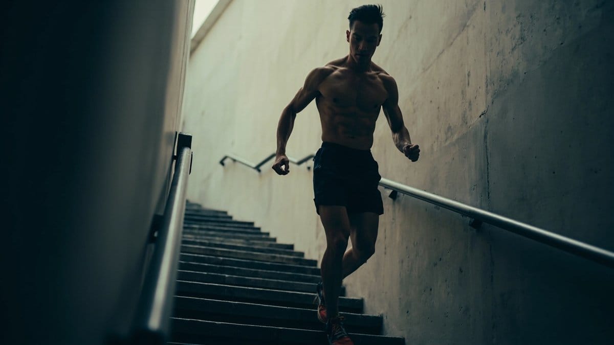 this routine - person climbing indoor stairs for fat loss cardio